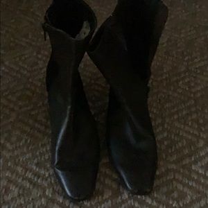 Brown leather and black boots